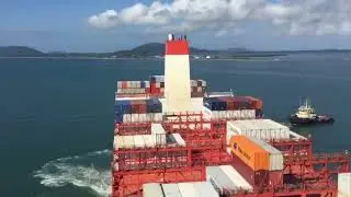 Sea Container Logistics Services. Shipping of goods in sea containers. Seaport. Container ships.