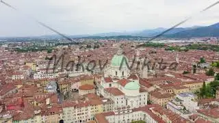 Brescia, Italy. Cathedral of Santa Maria Assunta. Flight over the city in cloudy weather, Aerial Vi