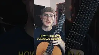 How to hold a #classicalguitar #guitar #guitarist #beginnerguitar #guitartips #guitartechnique