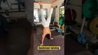 Handstand twisting #dcmusclemania #dcfittips #abs #workout #chestexercises #gym #pushups #situps