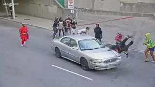 Police identify driver who hit protester in downtown Louisville