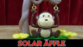 DIE SCHAUKELNDER AFFE SOLARFIGUR