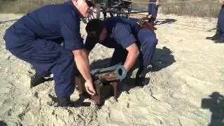 Rescue Men filming of the Breaches Buoy Drill