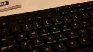 Erasing cheap pad printed keycaps with a Magic Eraser and some other tool