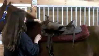 How to put on a western saddle
