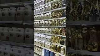 ￼Flask display, Sun and Sand Hypermarket Russell Kaima rack