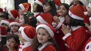 توزيع هدايا لرعية كنيسة مار نرساي في دهوك