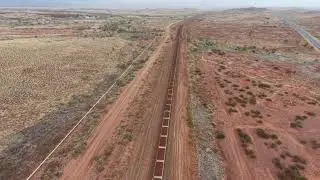 Pilbara Iron Ore Train passing Karratha weather radar with storm