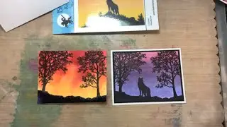Silhouette rocks & trees with Brusho background