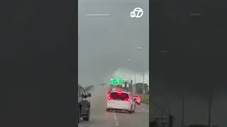 Large tornado spawned by Hurricane Milton crosses Florida interstate