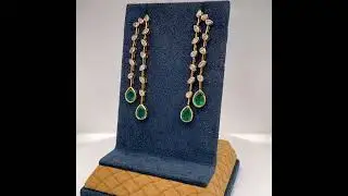 18Kt Yellow Gold Diamond and Green Emerald Dangling Earrings.