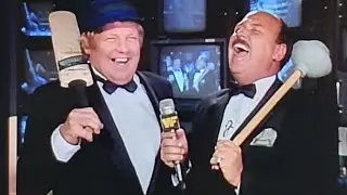Gene Okerlund and Lord Alfred Hayes having a laugh.
