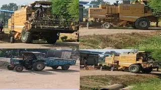 combine preet 987 harvester  l eicher tracter loading tralil