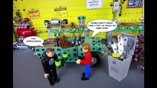 MECCANO MEN BUILD A FOUR FURROW REVERSIBLE PLOUGH.