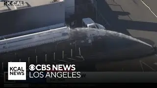 Commercial buildings evacuated after big rig catches fire in Commerce