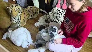 Destruction of a stuffed koala with hands and feet in pajamas