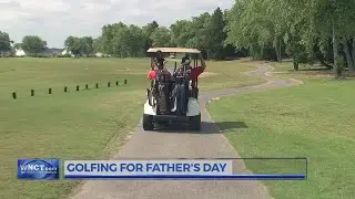 Fathers and sons spend Father's Day golfing together