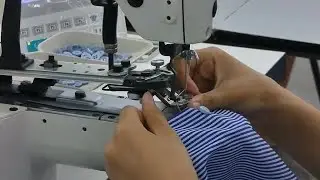 Attaching Buttons In Factory Stock Video