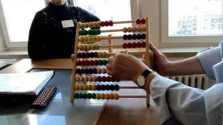 Rechenschieber: 25553 : 23 (Division)