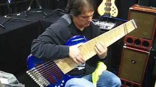 NAMM 2013 - Dude tries to play gnarly multi-string bass guitar