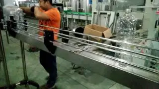 bottle infeed table adjusting