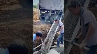 Pouring concrete paver drainage ditch