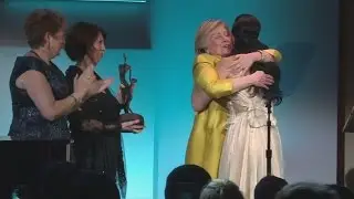 An unlikely pair: Hillary Clinton surprises Katy Perry at UNICEF Ball