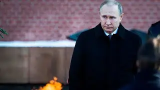 President Putin signs law to keep top job until 2036