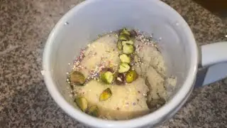 Eggless Pistachio Mug Cake with pistachio cream in centre |1-Min Microwave Dessert, No Oven
