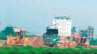 #excavator Compilation of excavators, road rollers, tracked vehicles, and dump trucks in operation.