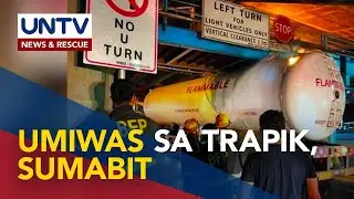 Oil tanker na may lamang LPG, sumabit sa foot bridge sa EDSA Quezon Avenue