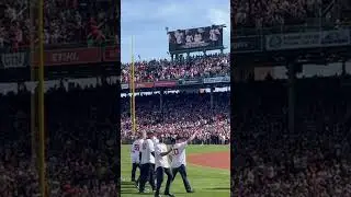 Trevor and Brianna Wakefield come out with the 2004 team during the home opener at Fenway Park