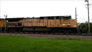 UP 6965 a C6044AC leads a Z train east through Geneva IL