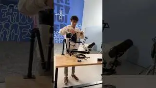 Content creator desk setup. Teleprompter, podcast mic, desk tripod for camera..