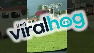 Crossing Semi Clipped by Oncoming Train || ViralHog