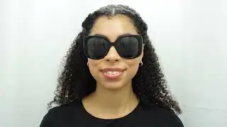 Woman model wearing Versace 4387 GB1/87 56mm Sunglasses