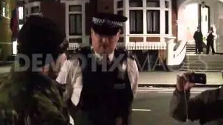 Police attempt to remove Assange supporters outside Ecuadorian Embassy