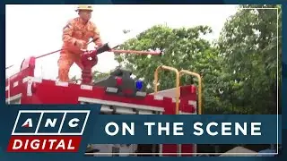 WATCH: Firefighters blast protesters with water cannons as they burn effigy of Marcos | ANC
