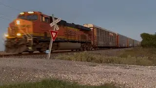 BNSF 6931 ES44C4 leads westbound Autoracks freight in Robstown, TX | County Road 83 |