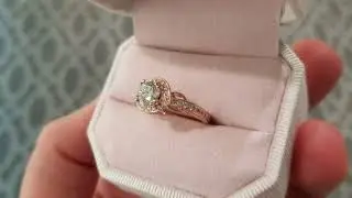 Vintage Style Rose Gold Diamond Engagement Ring with an Unique Halo