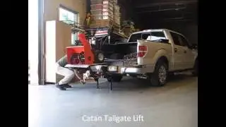 Catan Tailgate Lift - loading snowblower and outboard motor easily.
