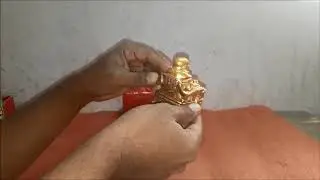 Kraft Village Laughing Buddha Sitting on Chair