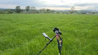 Live in the LONG GRASS. metal Detecting (trying to).