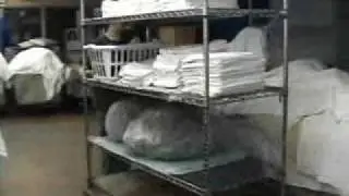 Motorized Clean Linen Wire Cart pushes clean linens in a hospital