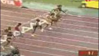 Perry is victorious in 100-meter hurdles