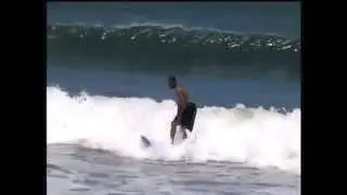 Crazy Capizzi skateboarding on his surfboard