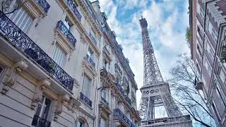 VideoVault Stock Video: Paris France street with Eiffel Tower in the background