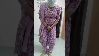 Crossdressing video in beautiful dress.