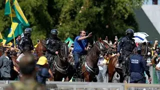 As Brazil Covid-19 cases pass 500,000 mark, Bolsonaro rallies, US sends unproven drug