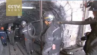 China flooded mine: Rescuers pumping out water